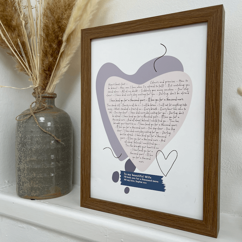 layered heart song lyrics print representing our engagement collection