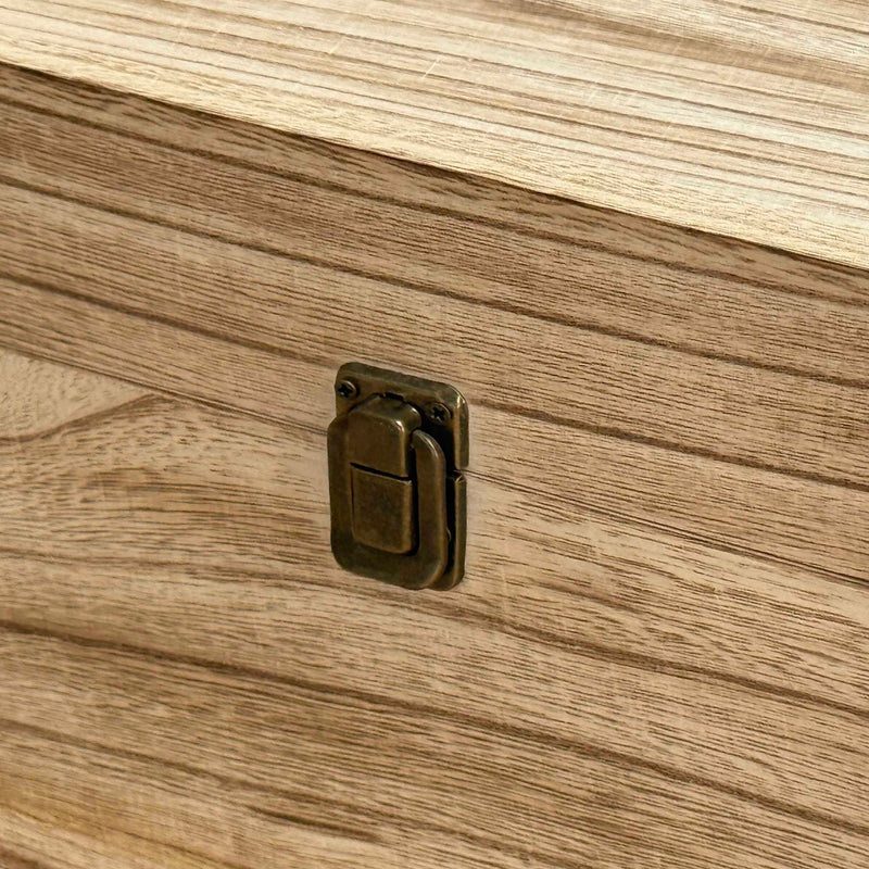Close-up of a wooden surface with a metal latch
