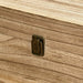 Close-up of a wooden surface with a metal latch