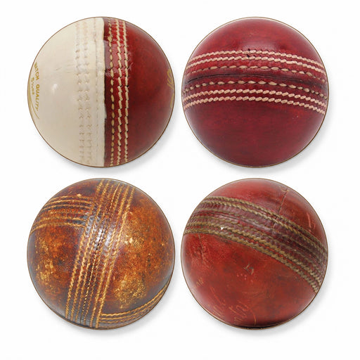 Four vintage cricket balls arranged in a 2x2 grid on a plain white background, showing different stages of aging and wear.
