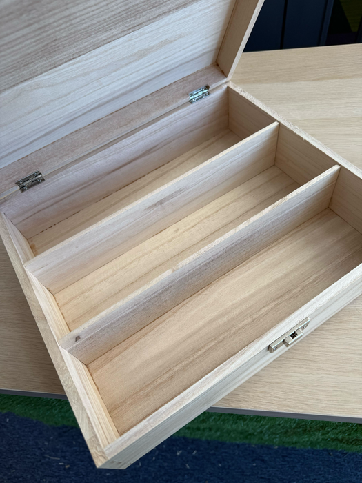 Empty three-compartment wooden wine box shown open, designed to hold three bottles securely for gifting or display.