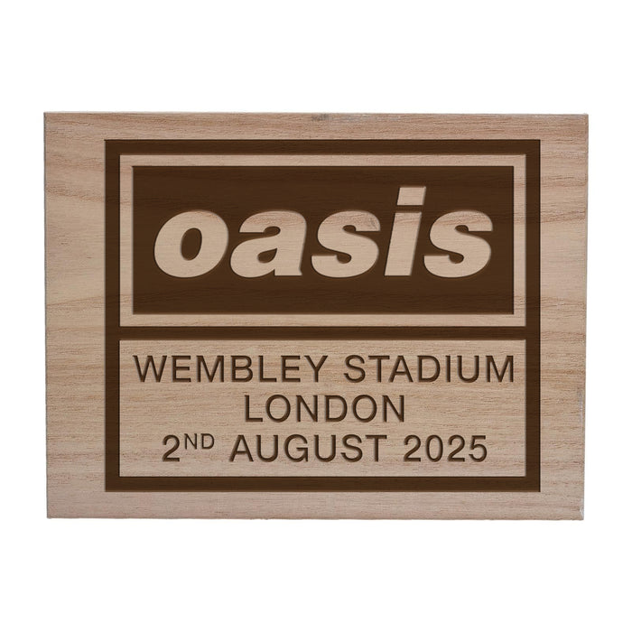 Engraved wooden plaque featuring the Oasis logo and concert details reading “Wembley Stadium London, 2nd August 2025,” laser-etched into natural wood.