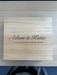 Top view of a personalised wooden wine box engraved with “Adam & Katie — Wishing you a lifetime of love and happiness.”