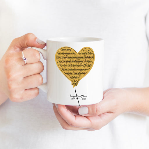 personalised balloon lyrics mug with heart-shaped song lyric design, custom names and date