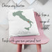 Personalised map cushion with green silhouette of Italy and red heart marking a location, customised with names, venue and date, styled on a pink chair with overlay text promoting personalisation options.
