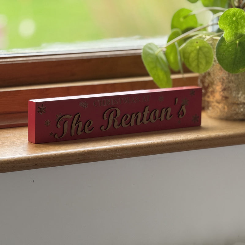 Personalised Freestanding Christmas Sign – Custom Family Name Wooden Decoration | ‘Christmas At’ Snowflake Design in Red, White or Grey | Holiday Mantel & Shelf Décor Gift