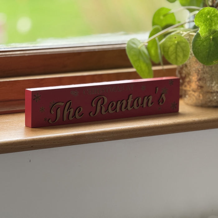Personalised Freestanding Christmas Sign – Custom Family Name Wooden Decoration | ‘Christmas At’ Snowflake Design in Red, White or Grey | Holiday Mantel & Shelf Décor Gift