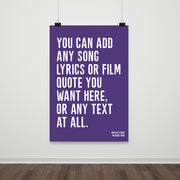 A large poster with a purple background and bold white text that reads: “You can add any song lyrics or film quote you want here, or any text at all.” The customizable message is printed in a simple, modern font and hung on a plain white wall with black clips.