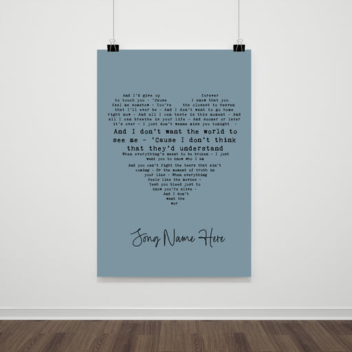 Personalised song lyric heart print with bold main lyric line and custom song title, blue background colour option, modern typography