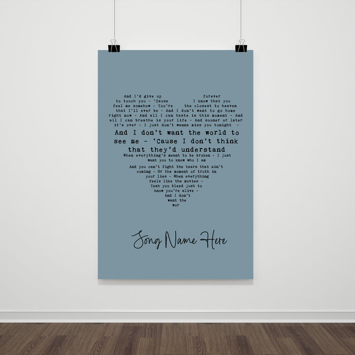 Personalised song lyric heart print with bold main lyric line and custom song title, blue background colour option, modern typography