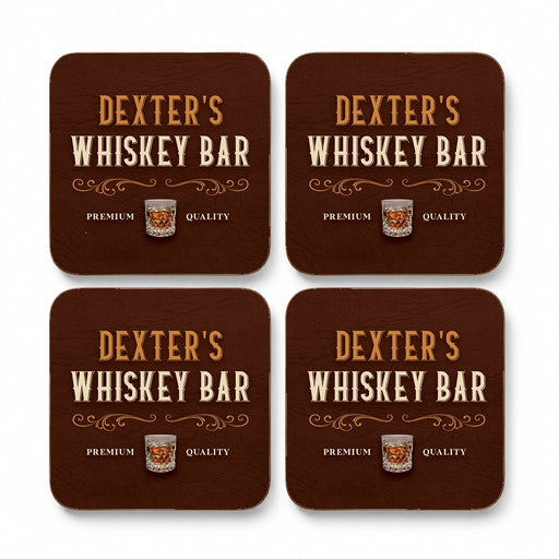 Set of four personalised whisky coasters with custom name and traditional wood effect whisky bar design