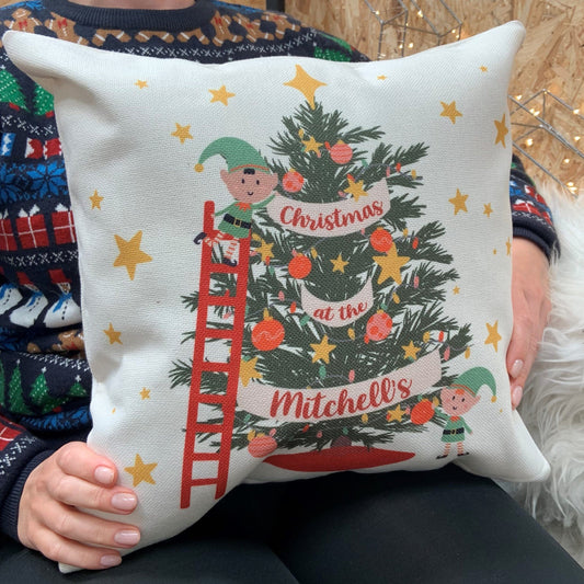 Christmas cushion with family name and elves decorating tree