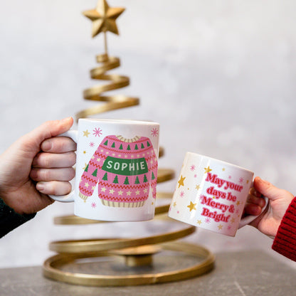 Ugly bright coloured Christmas Sweater on a mug with initial
