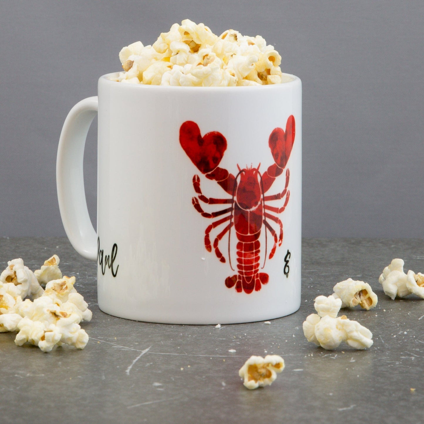 Pair of personalised lobster mugs with names of happy couple