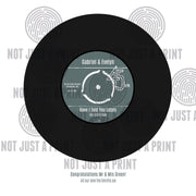 Vinyl record in a frame of number 1 song on day born