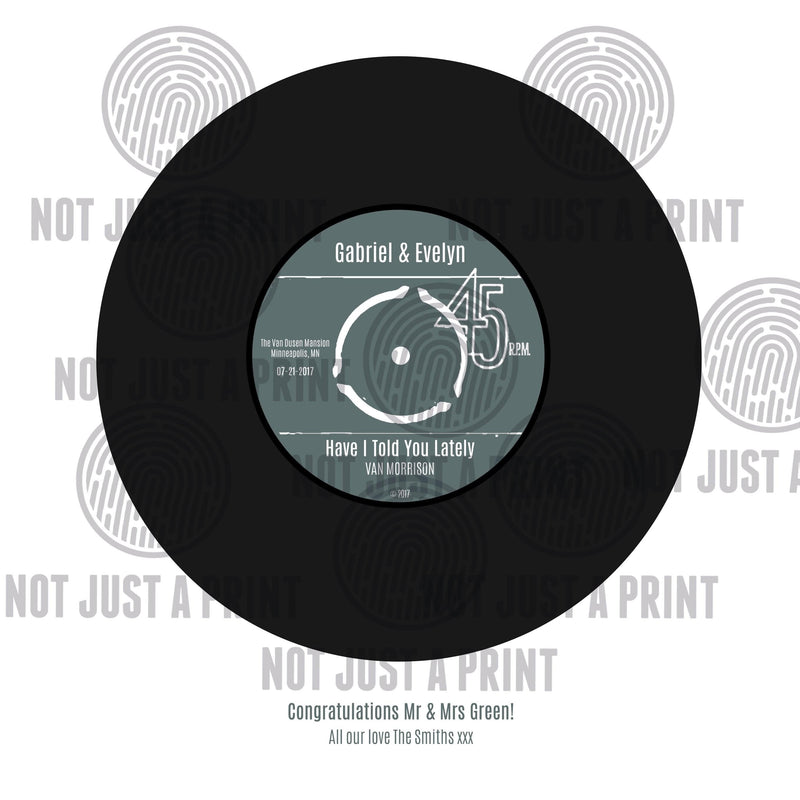 Vinyl record in a frame of number 1 song on day born